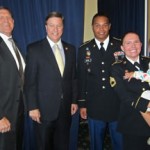 United Through Reading Board of Trustees member and VP of Government Relations, BAE Systems, Mr. Doug Stewart welcomed Congressman Mike Rogers (AL), SSG Vince Moore, SFC Jessica Stafford Moore and their daughter Olivia.