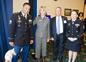 United Through Reading CEO Dr. Sally Ann Zoll shared how her son used the program to stay connected to his children during a recent deployment. Here she posed with SSG Vince Moore, SFC Jessica Stafford-Moore, Olivia, and Congressman Joe Wilson (SC).  Congressman Wilson’s son used the program during deployment to stay connected to his nieces and nephews.